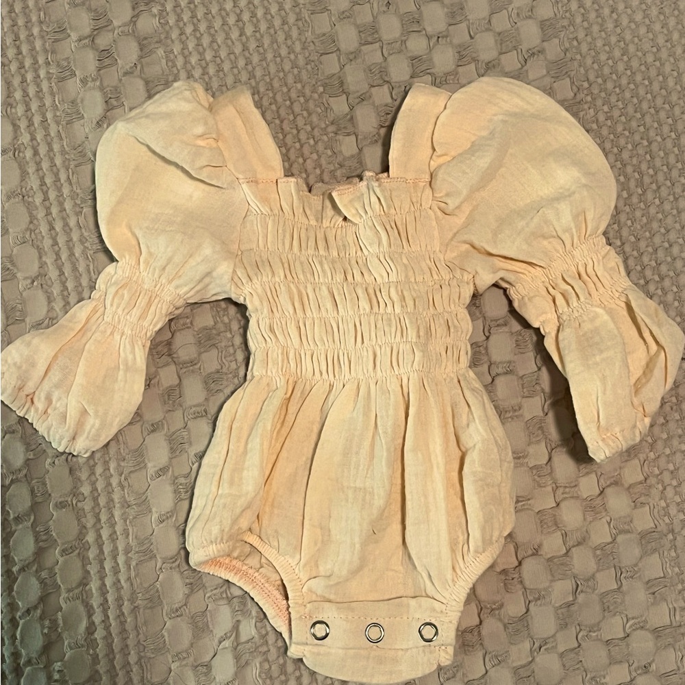 Peach colored newborn outfit. Washed but unworn